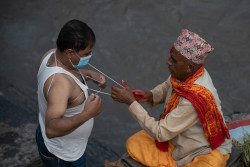 Nepalis celebrate Janai Purnima with fun and gaiety (Photo Gallery)